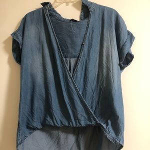 Women’s high low top, opens from front. Size S!